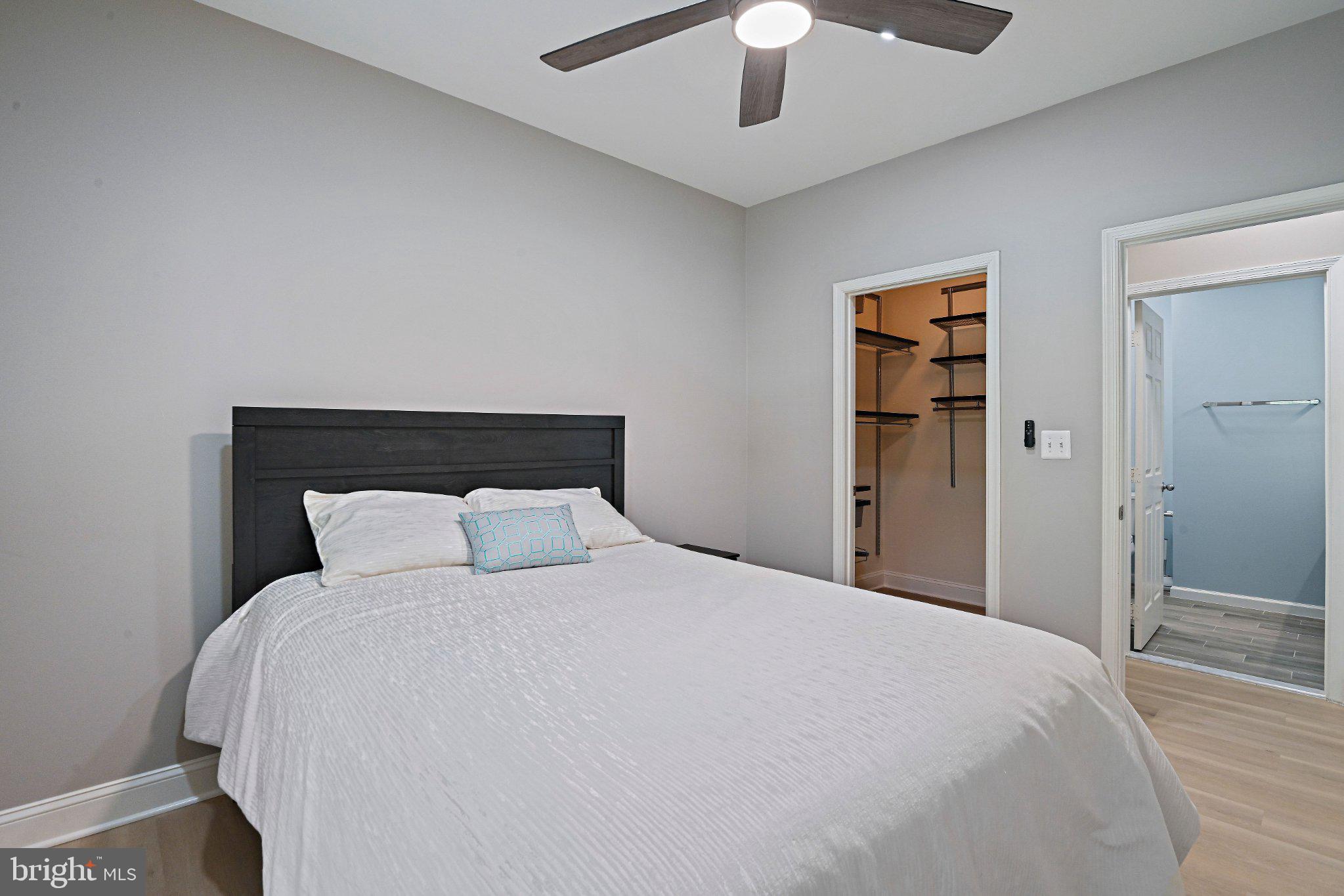 1519 North Point Drive, Unit 202 Reston, VA 20194 - Photo 25 of 49 Modern bedroom with serene ambiance.