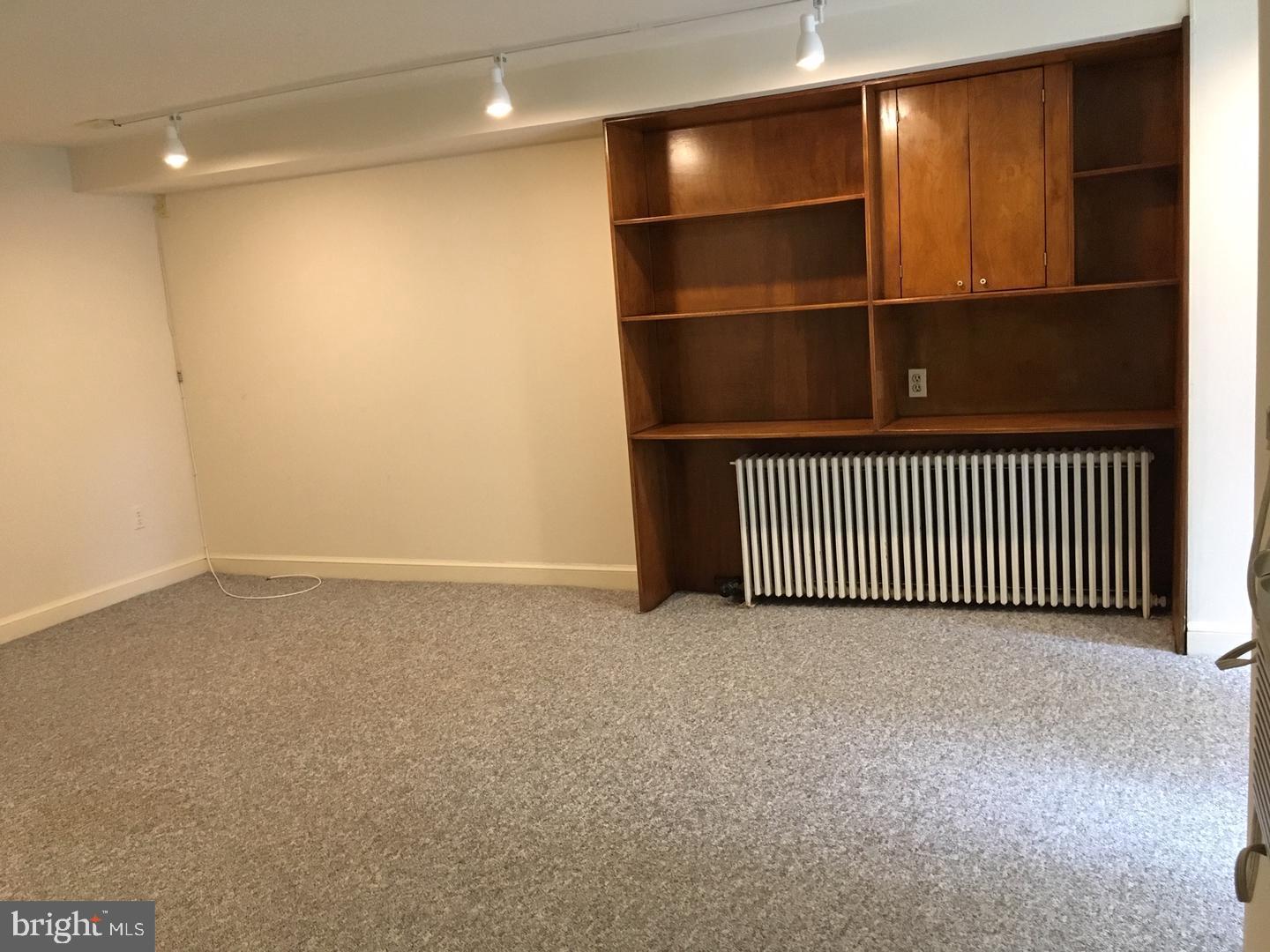 2007 Kalorama Road Northwest Washington, DC 20009 - Photo 5 of 19 5 / 19Living room with built in cabinets