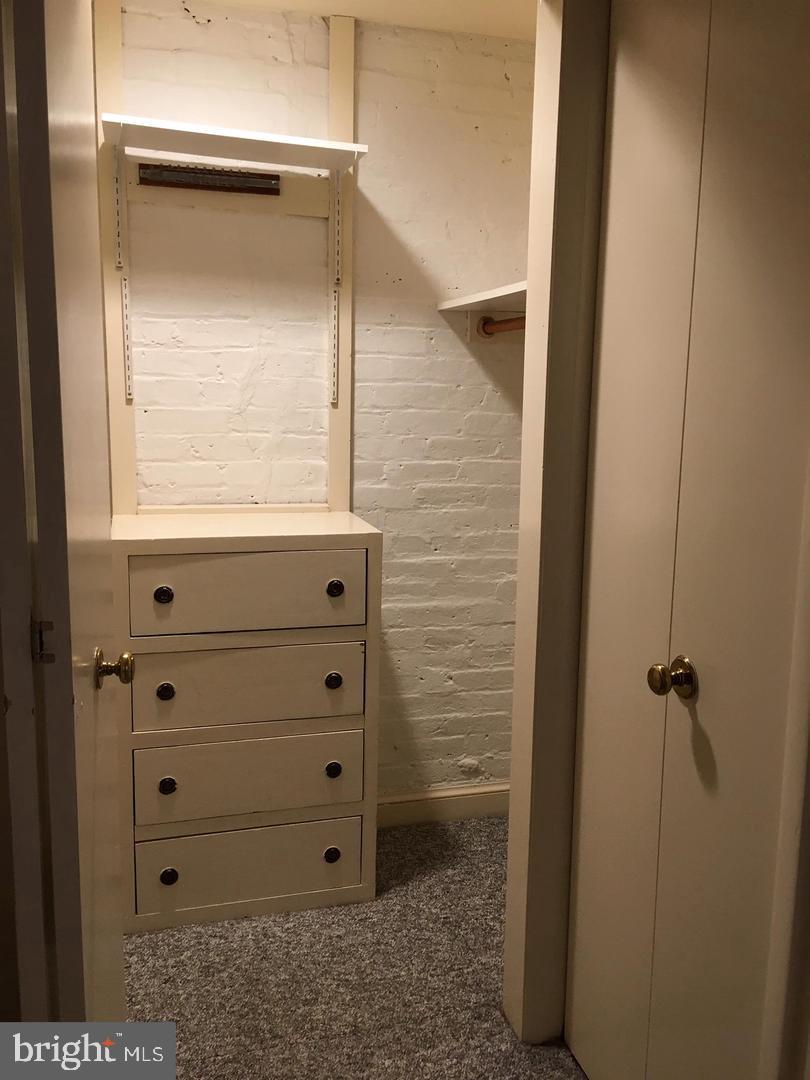 2007 Kalorama Road Northwest Washington, DC 20009 - Photo 10 of 19 Small walk in closet with built in cabinet