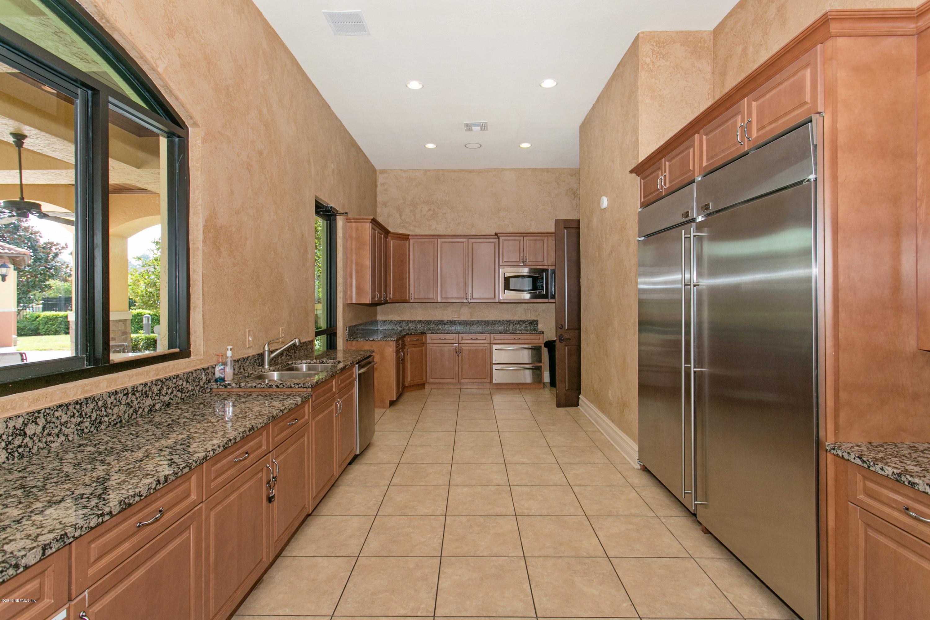 9745 Touchton Road, Unit 1429 Jacksonville, FL 32246 - Photo 25 of 26 025_Clubhouse Kitchen