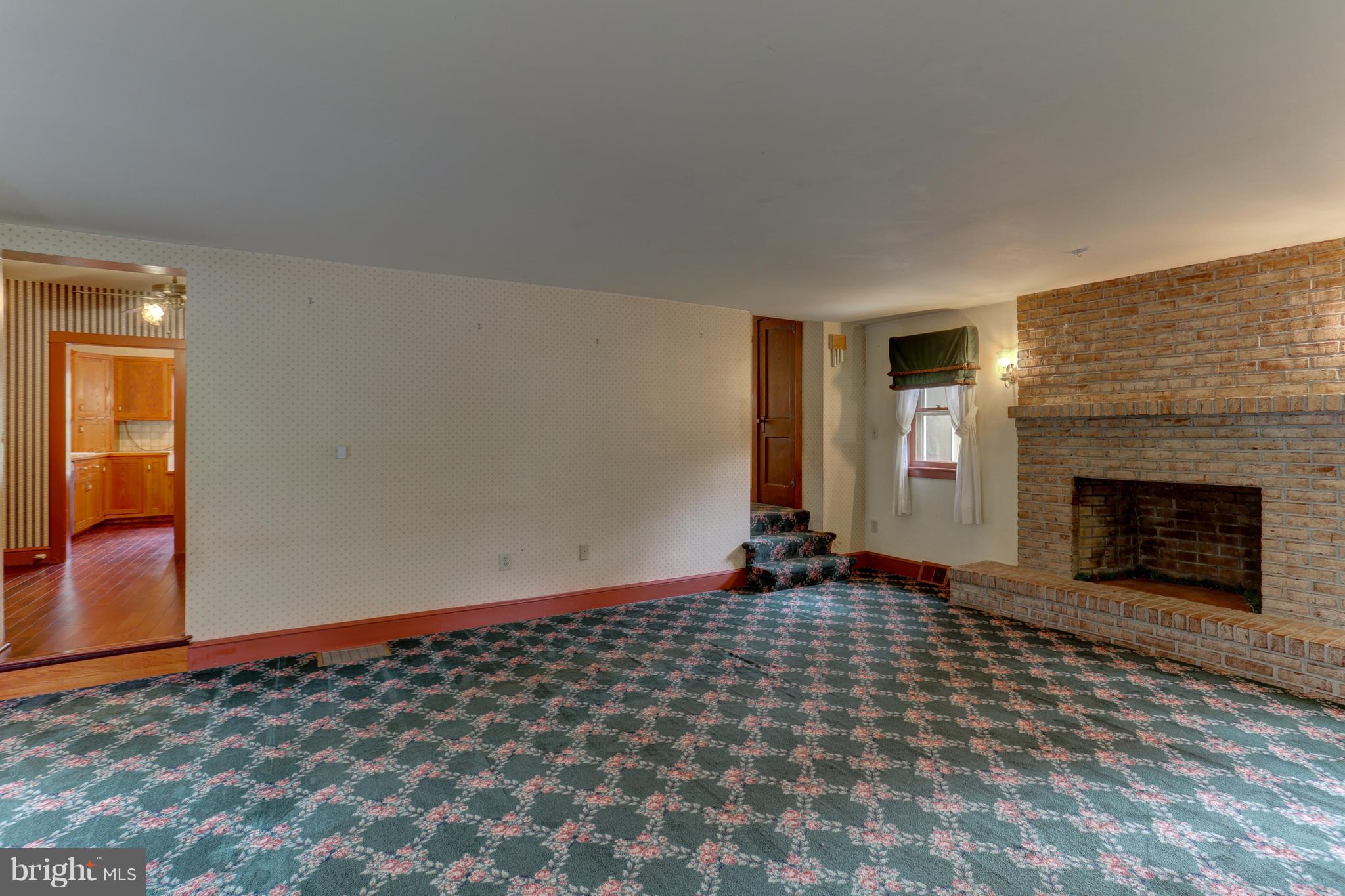 240 School House Road Lancaster, PA 17603 - Photo 17 of 38 Living Room wth Wood Burning Fireplace