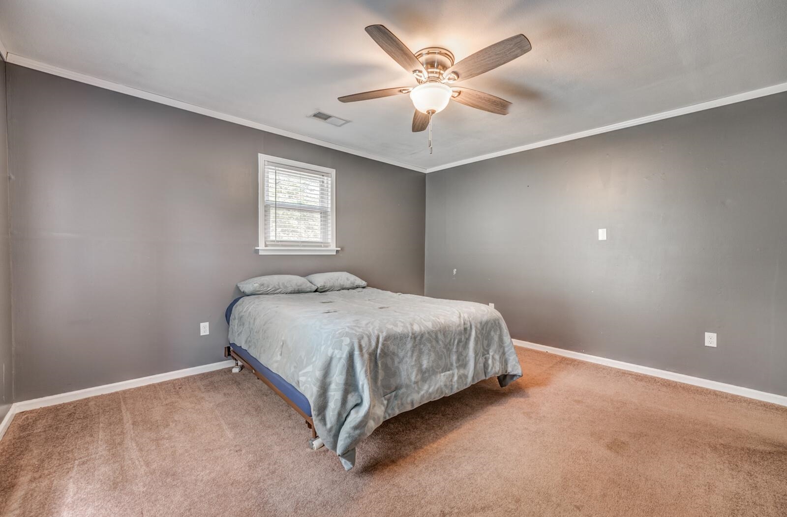 6125 Warren Road Oakland, TN 38060 - Photo 31 of 40 Carpeted room with a ceiling fan light fixture