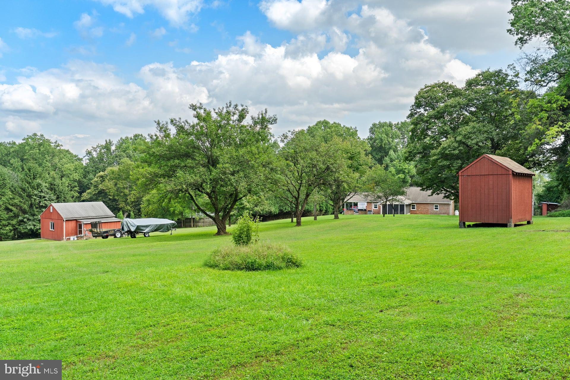 2012 Miller Road Hummelstown, PA 17036 - Photo 41 of 52 Backyard with sheds and barn