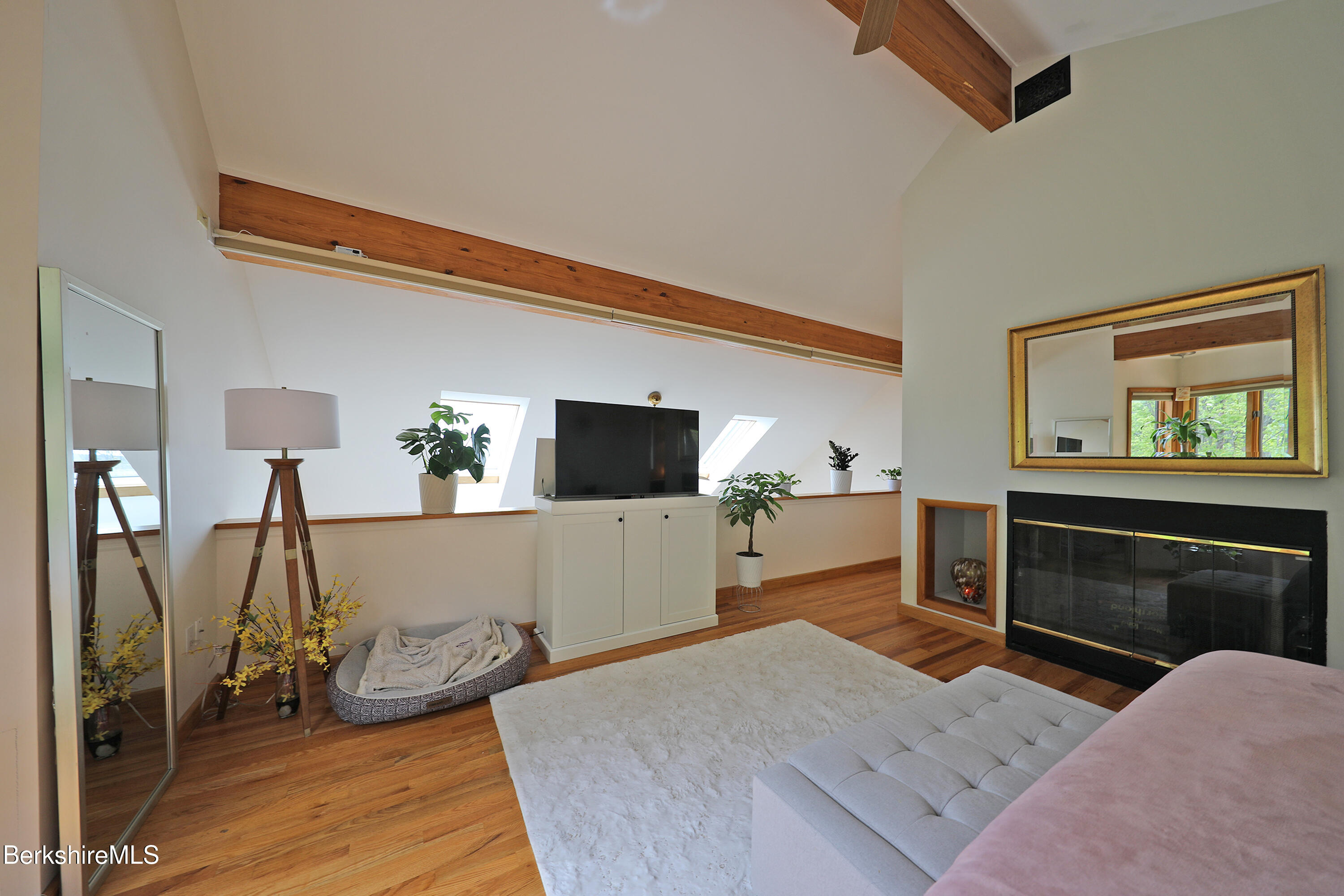 126 Temple Road New Lebanon, NY 12125 - Photo 6 of 37 a bedroom with furniture and a flat screen tv