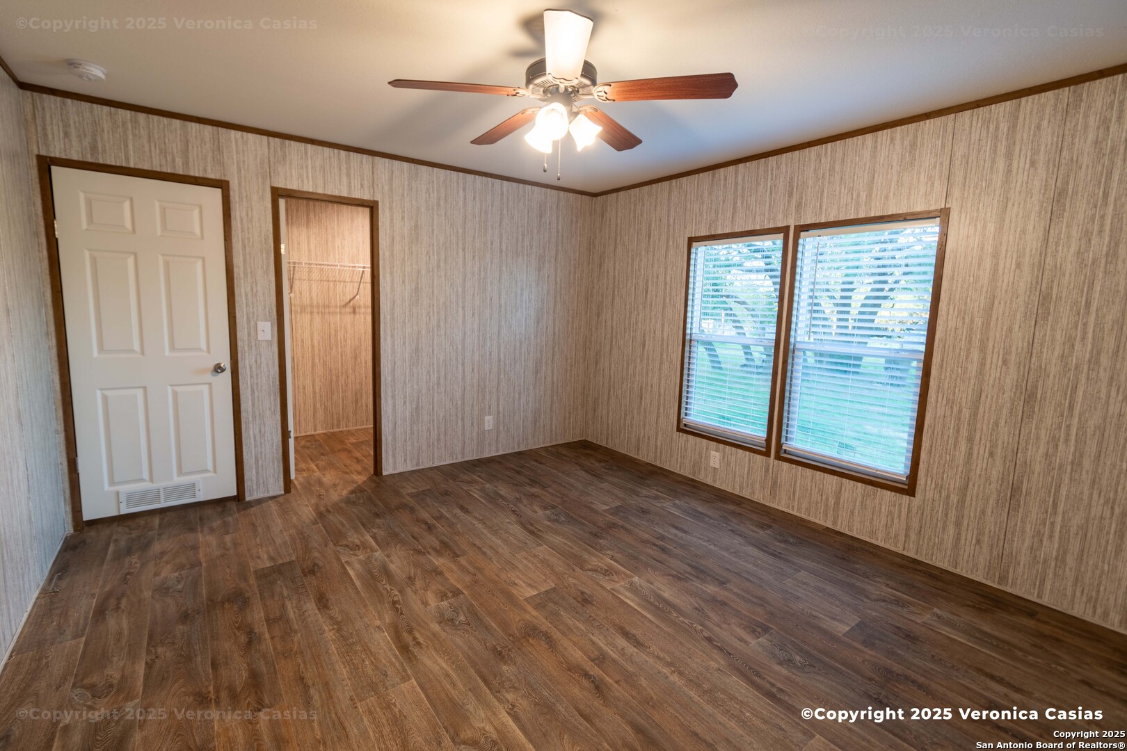 336 County Road 6846 Lytle, TX 78052 - Photo 13 of 20 wooden floor in an empty room with a window