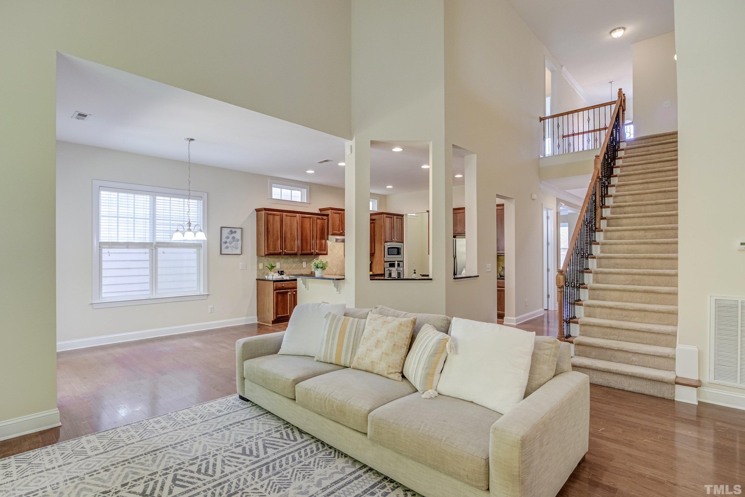 1016 Chapanoke Road Raleigh, NC 27603 - Photo 17 of 49 a living room with furniture and a flat screen tv