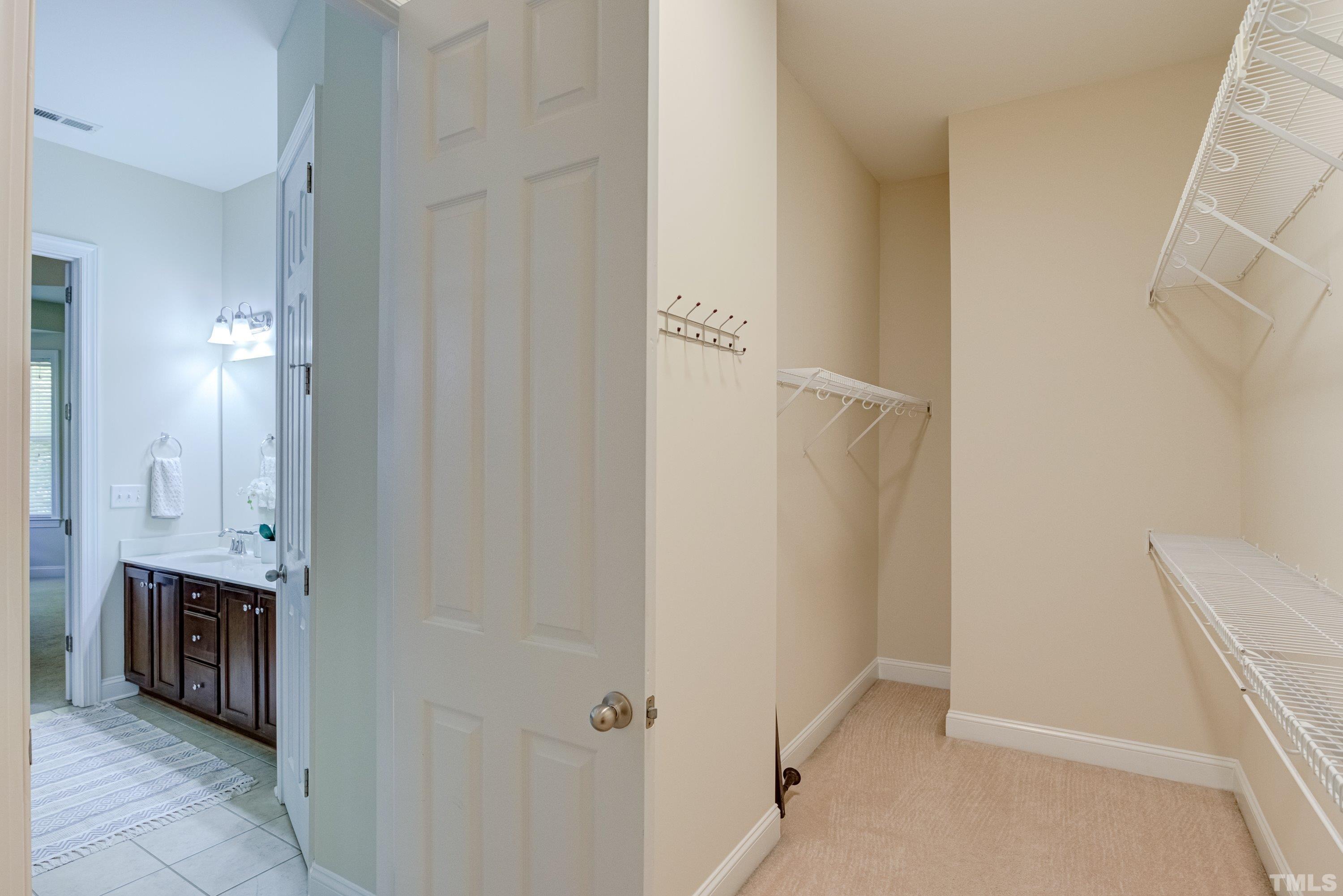 1016 Chapanoke Road Raleigh, NC 27603 - Photo 28 of 49 a bathroom with a sink and a mirror
