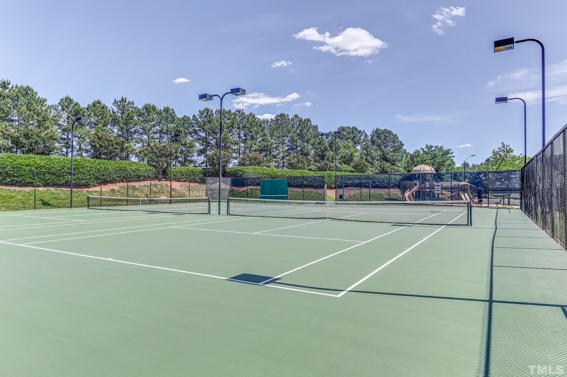 1016 Chapanoke Road Raleigh, NC 27603 - Photo 48 of 49 a view of a tennis court