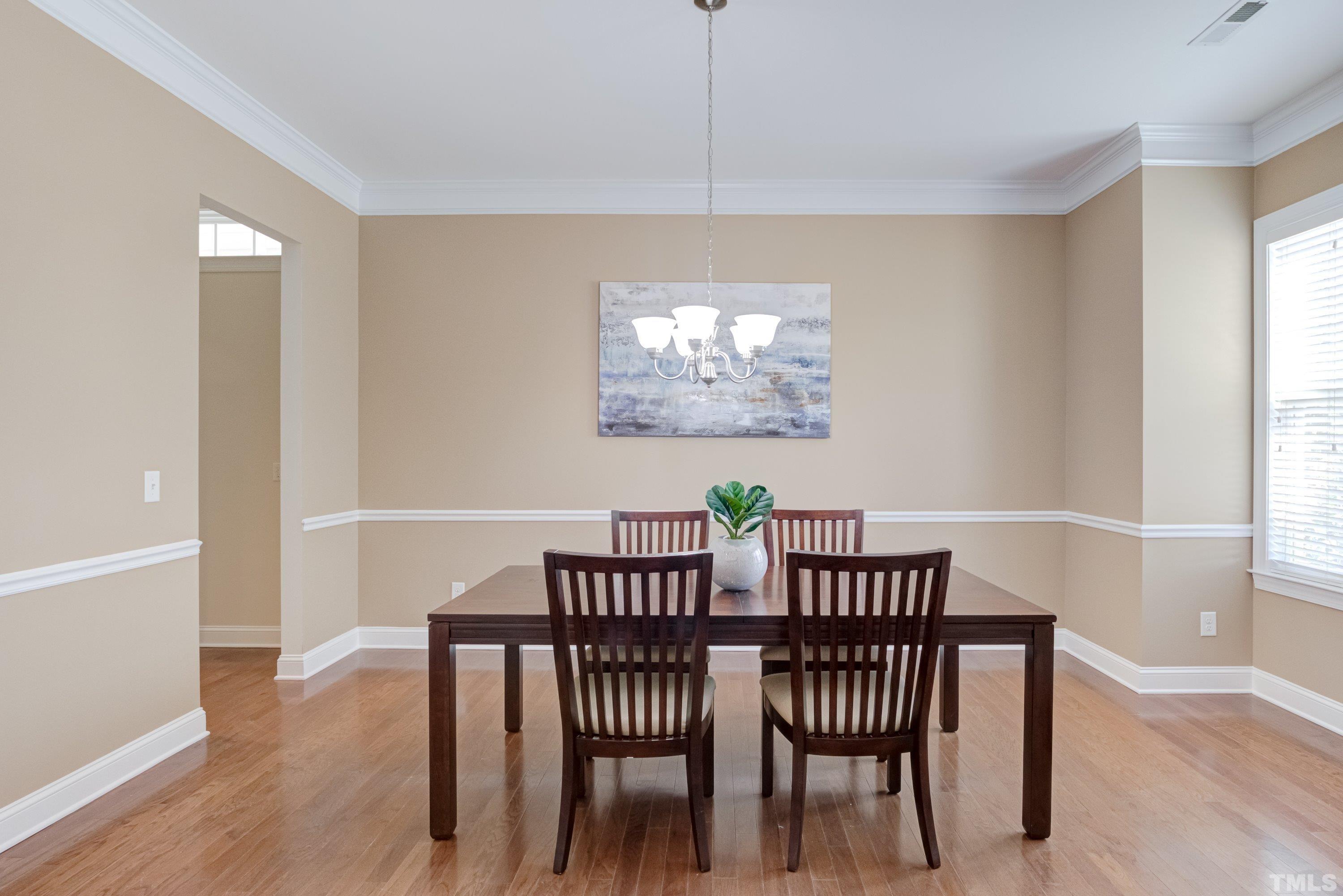 1016 Chapanoke Road Raleigh, NC 27603 - Photo 6 of 49 a view of a dining room with furniture and window