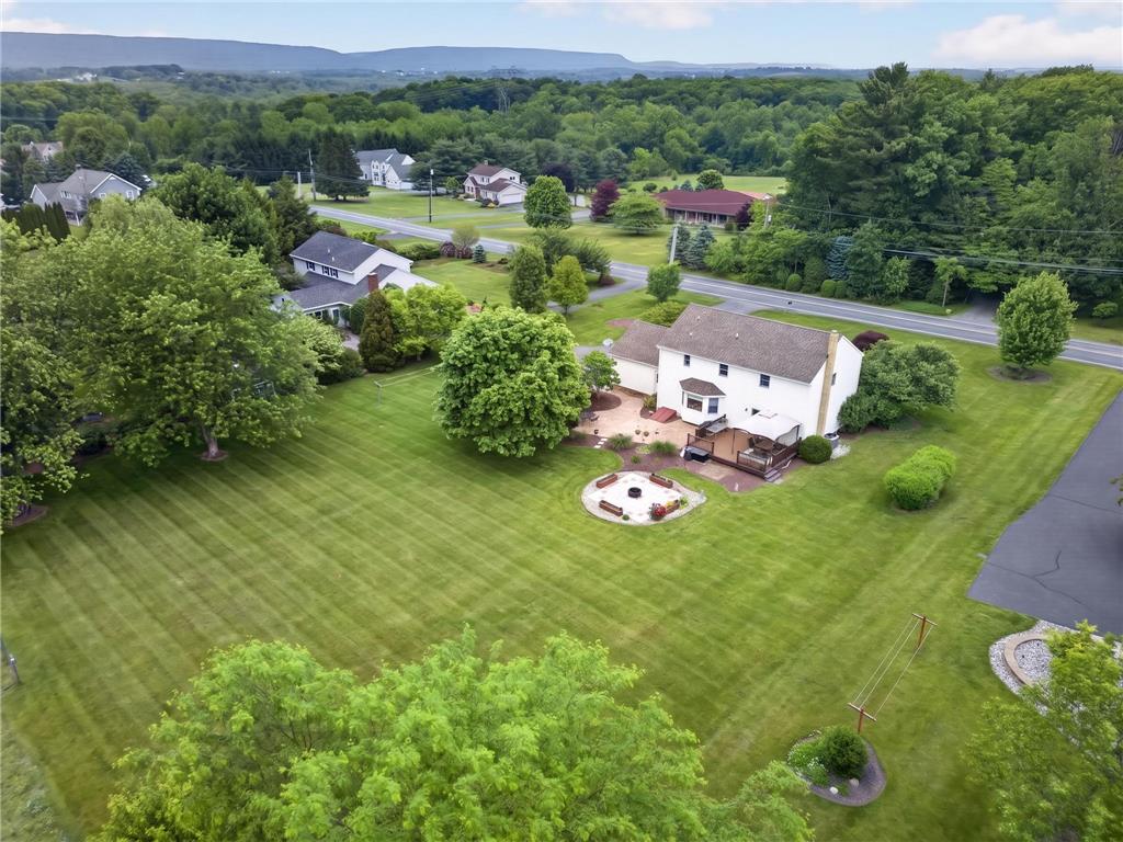 853 Lahr Road Nazareth, PA 18064 - Photo 28 of 29 An aerial perspective reveals a spacious estate with vast green lawns and distant mountain views.