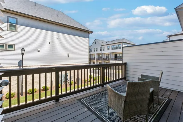 a view of a chair in the balcony