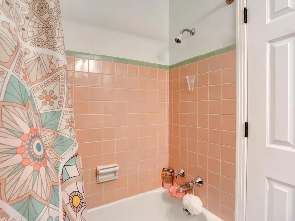 a bathroom with a bath tub