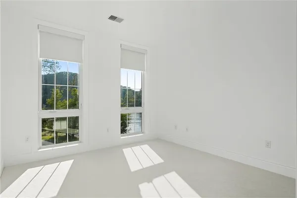 an empty room with windows