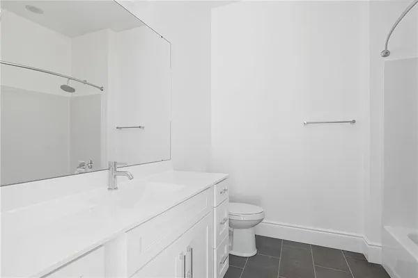 a bathroom with a sink and a toilet