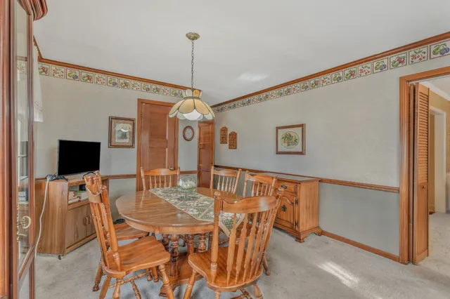 a view of a dining room with furniture