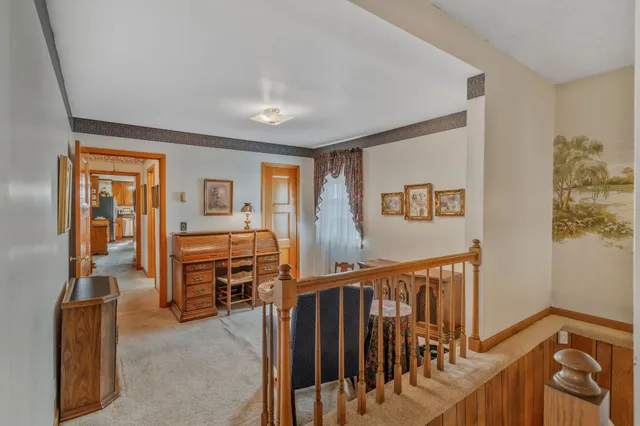 a view of a hallway with workspace