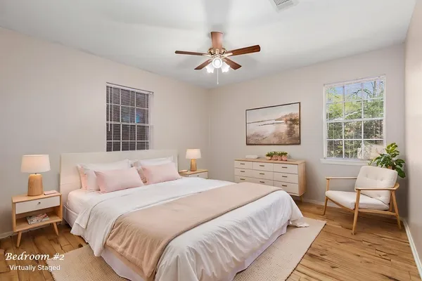 a bedroom with a bed and a table