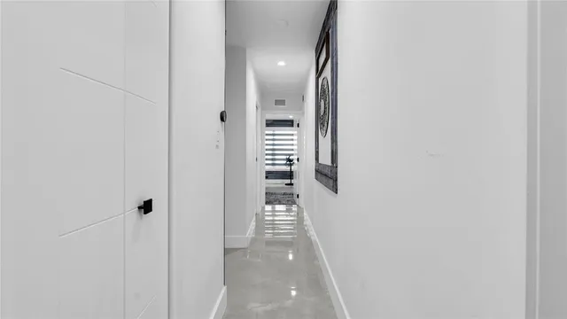 a bedroom with a bed and a desk