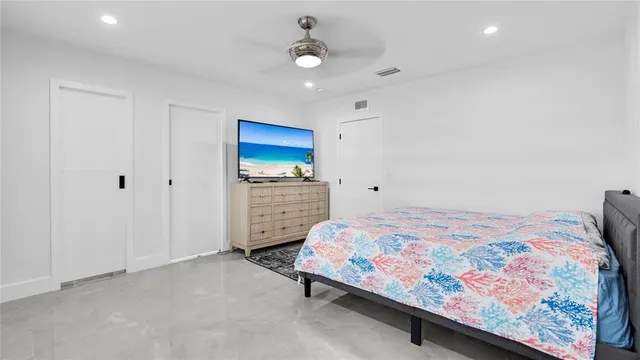 a bathroom with a sink a mirror and shower