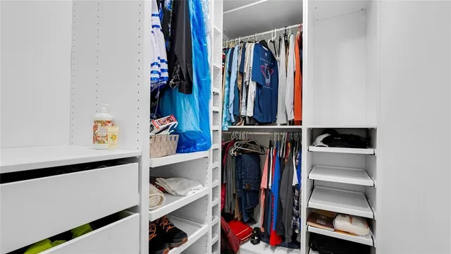 a view of a porch with a table and chairs