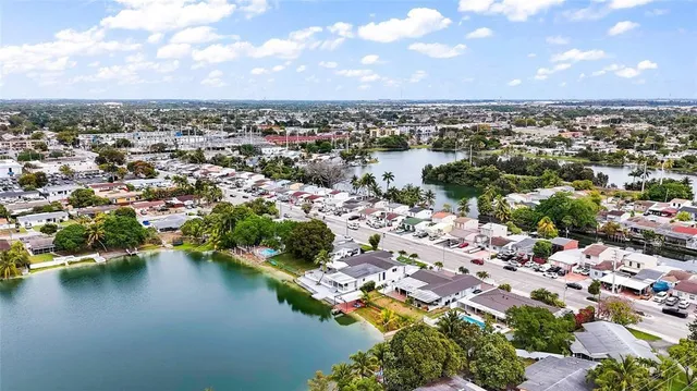 a front view of house with yard and outdoor seating