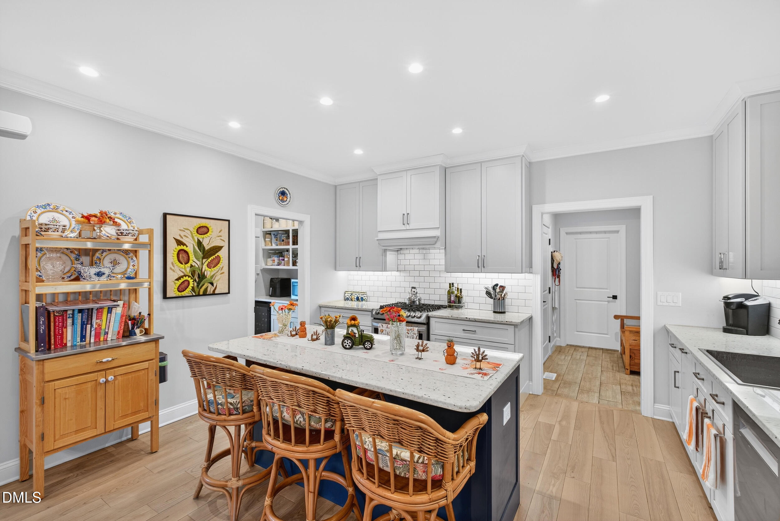 7528 McBane Mill Road Graham, NC 27253 - Photo 13 of 46 a view of a dining room with furniture a rug and wooden floor