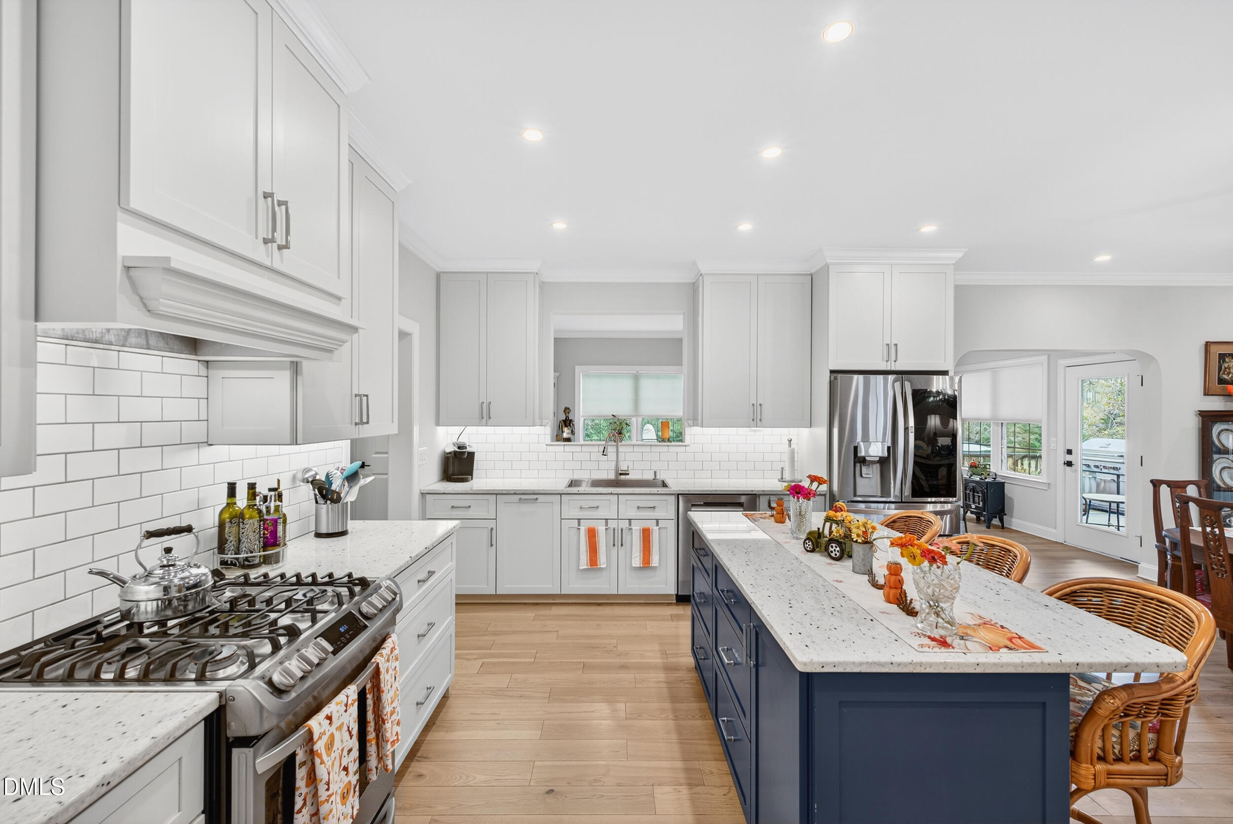 7528 McBane Mill Road Graham, NC 27253 - Photo 14 of 46 a large kitchen that has a lot of cabinets a sink and a stove in it