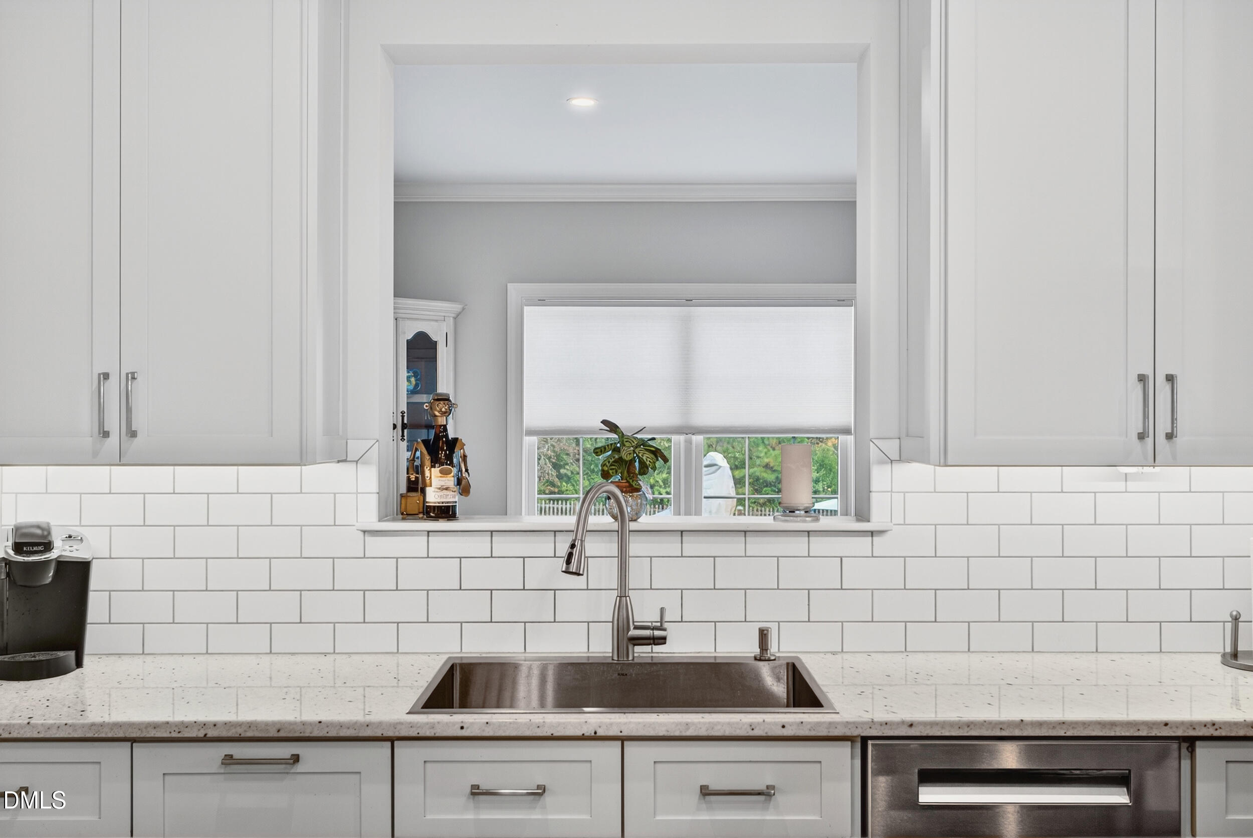 7528 McBane Mill Road Graham, NC 27253 - Photo 16 of 46 a kitchen with a sink and cabinets