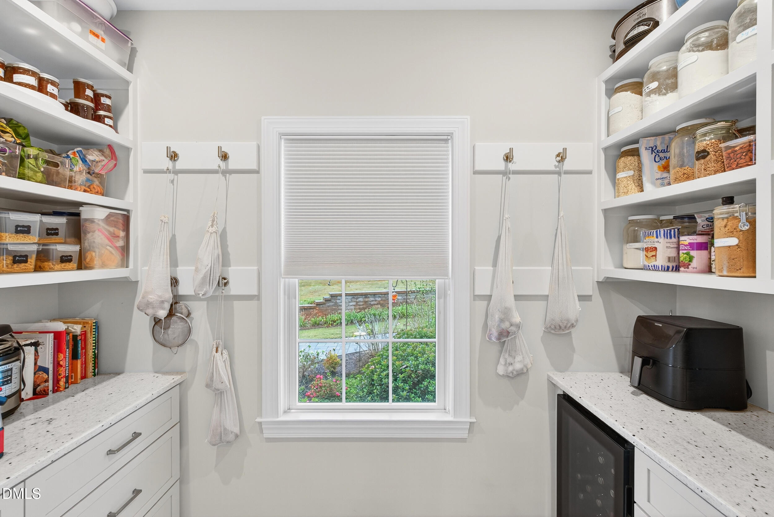 7528 McBane Mill Road Graham, NC 27253 - Photo 19 of 46 a kitchen with stainless steel appliances granite countertop a refrigerator and a stove top oven