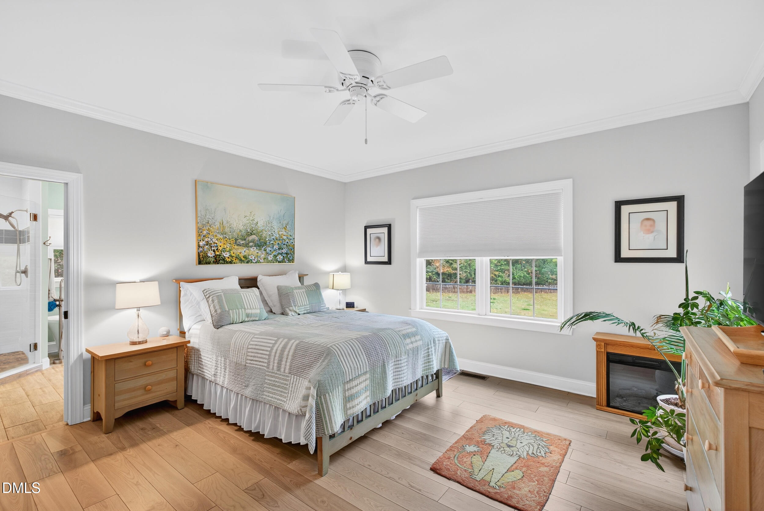 7528 McBane Mill Road Graham, NC 27253 - Photo 27 of 46 a bedroom with a large bed and a window