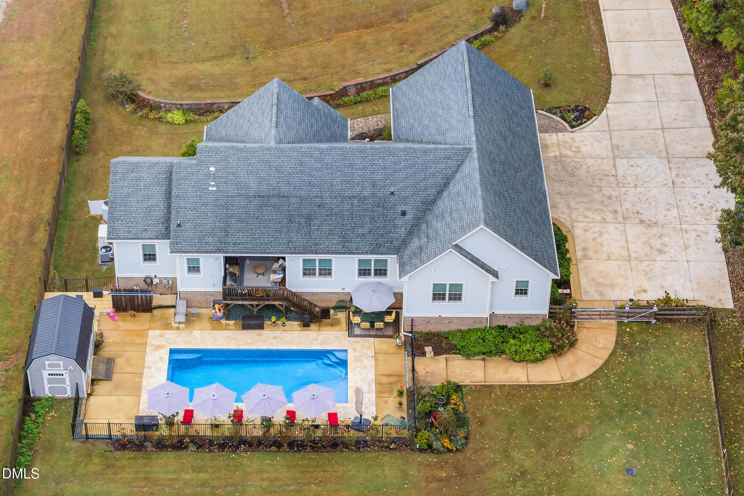 7528 McBane Mill Road Graham, NC 27253 - Photo 41 of 46 an aerial view of a house with swimming pool and patio