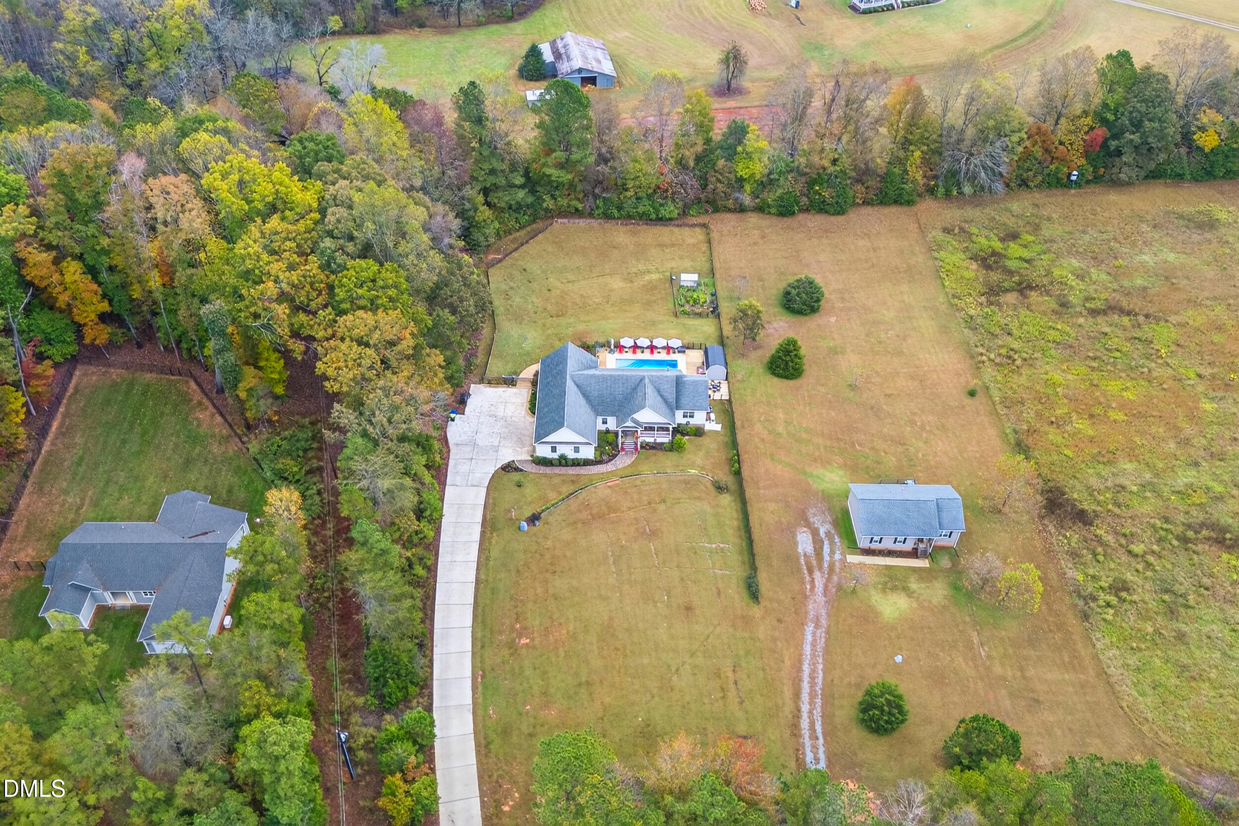 7528 McBane Mill Road Graham, NC 27253 - Photo 43 of 46 aerial view of a house with a lake view