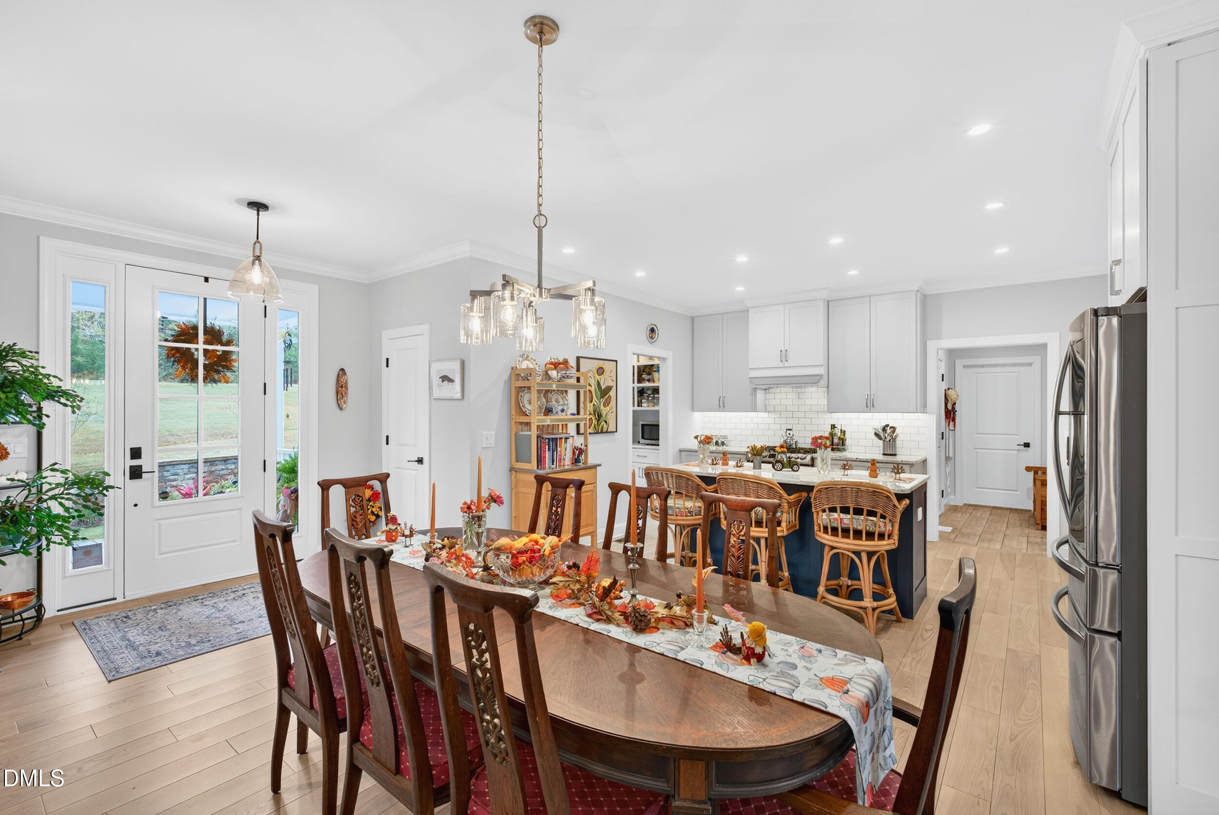 7528 McBane Mill Road Graham, NC 27253 - Photo 10 of 46 a large kitchen with a table and chairs