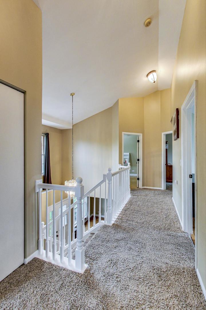 2385 North Periwinkle Way Round Lake Beach, IL 60073 - Photo 20 of 51 a view of a hallway with a livingroom