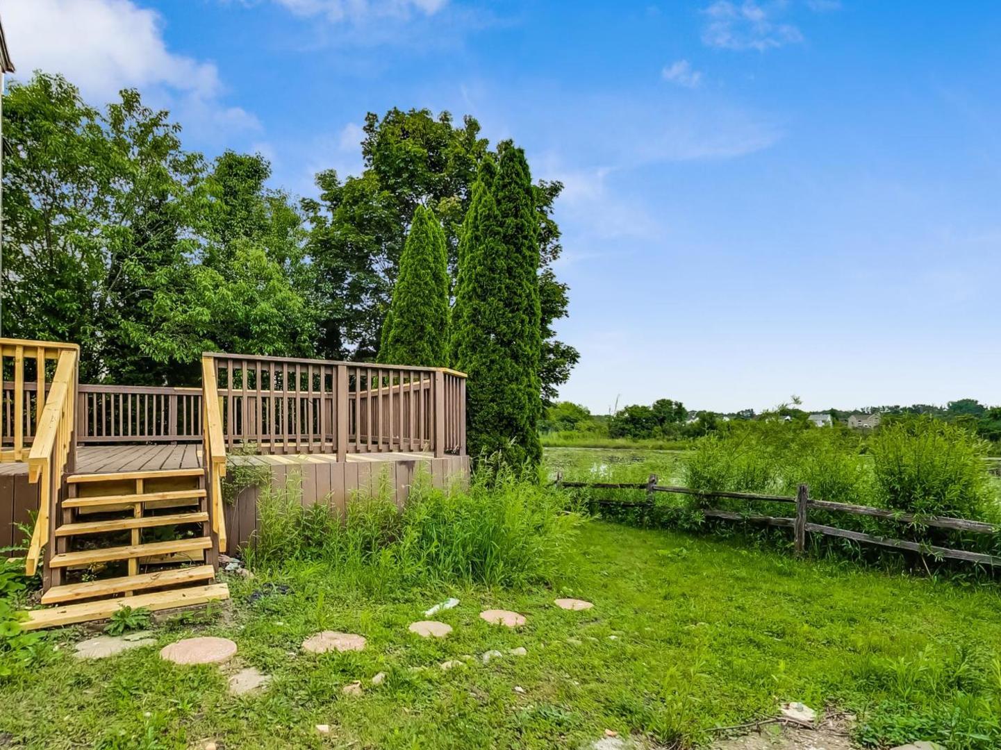 2385 North Periwinkle Way Round Lake Beach, IL 60073 - Photo 47 of 51 a view of deck and garden