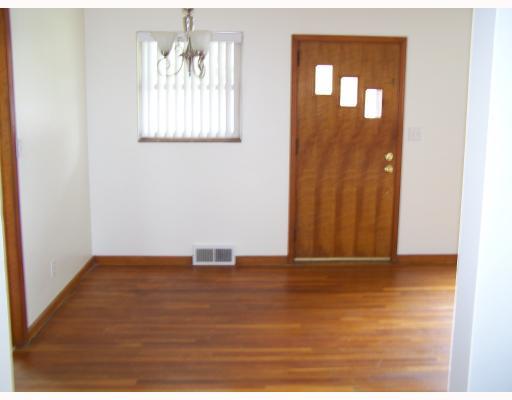 Exterior Front. Woodburing fireplace with original hardwood floors