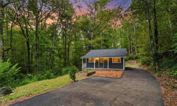 a house view with a outdoor space