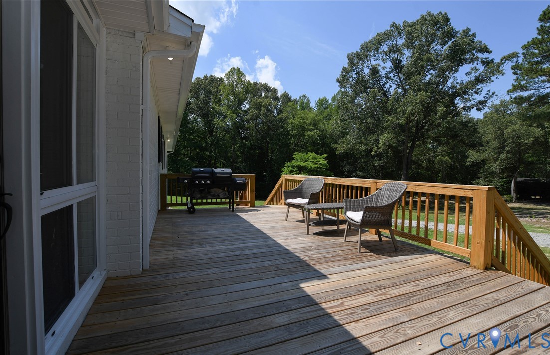 1448 Canterbury Road St. Stephens Church, VA 23148 - Photo 39 of 57 Spacious outdoor deck featuring wood flooring and