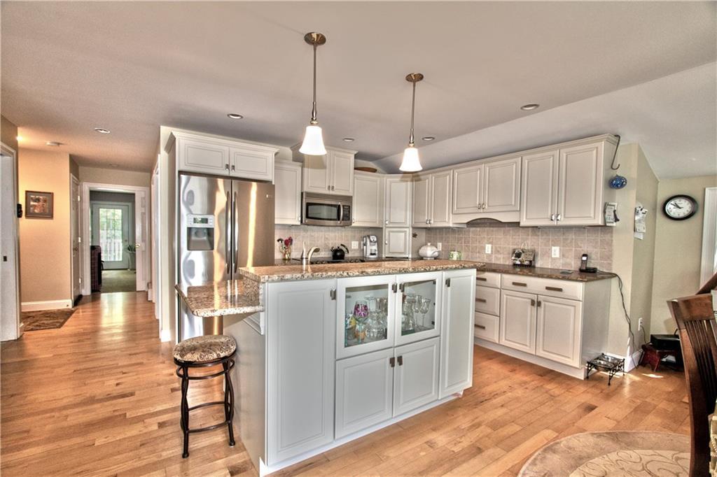 87 Whites Bridge Road Windham, ME 04062 - Photo 23 of 32 Beautiful granite bar with lots of...