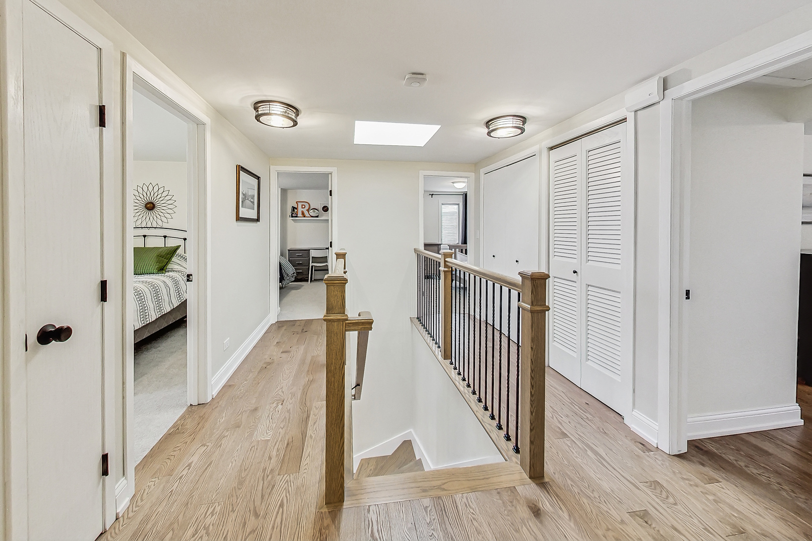 238 South Merrill Street Park Ridge, IL 60068 - Photo 14 of 40 a view of a hallway with wooden floor and stairs
