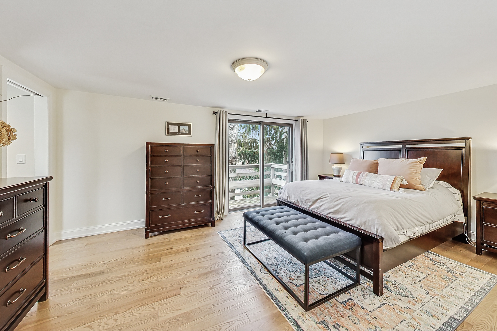238 South Merrill Street Park Ridge, IL 60068 - Photo 15 of 40 a bedroom with a bed and wooden floor