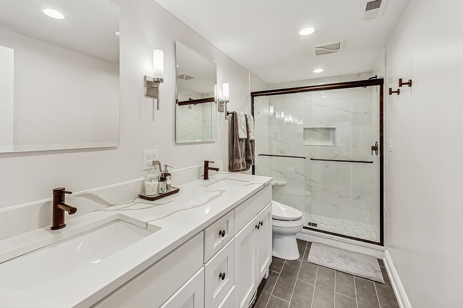238 South Merrill Street Park Ridge, IL 60068 - Photo 17 of 40 a bathroom with a sink a toilet and a mirror