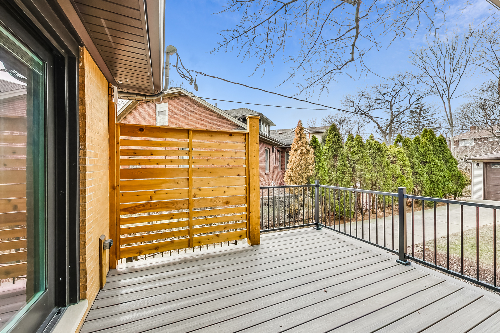 238 South Merrill Street Park Ridge, IL 60068 - Photo 32 of 40 a view of a balcony with wooden floor and fence