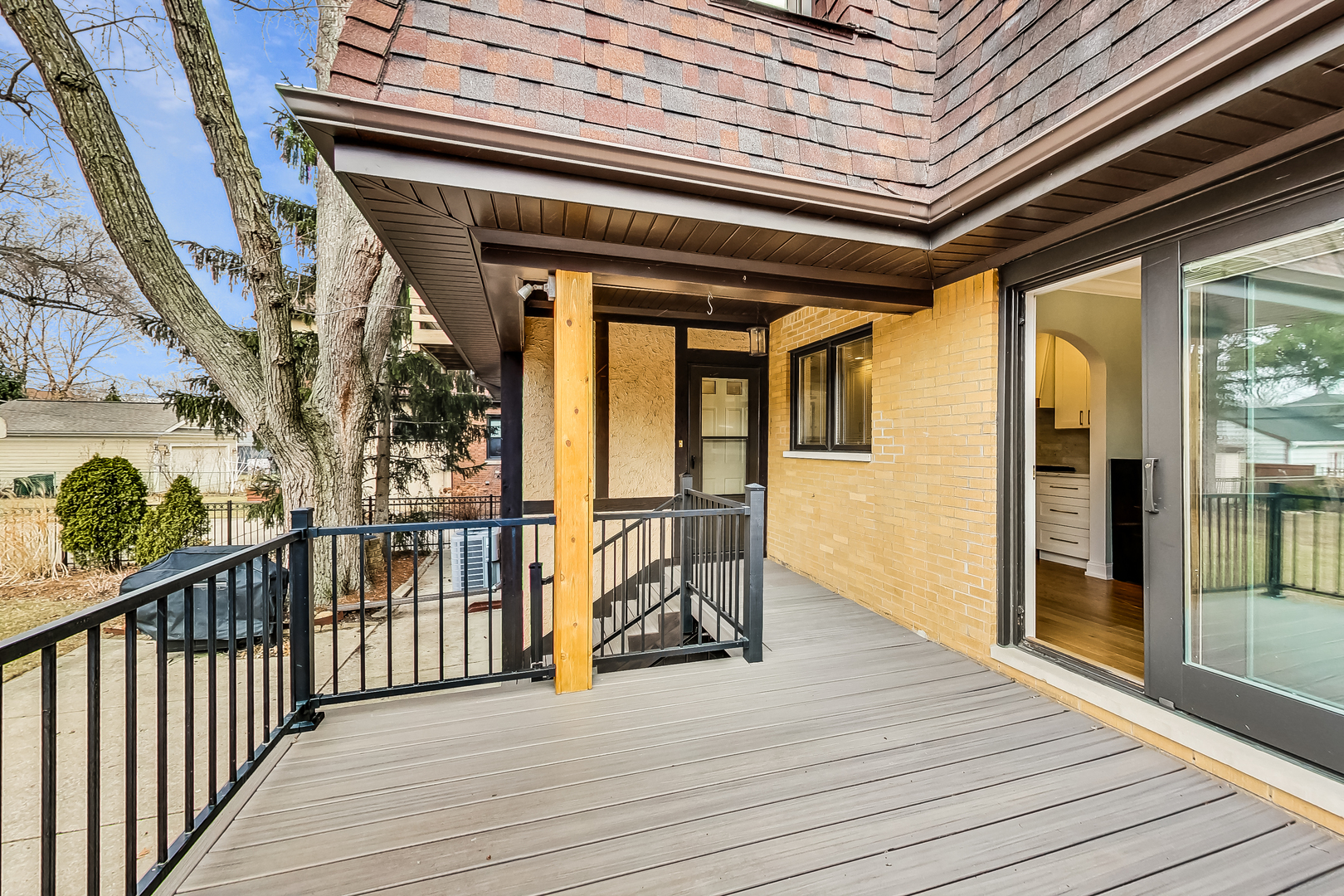 238 South Merrill Street Park Ridge, IL 60068 - Photo 33 of 40 a view of a porch with wooden floor and stairs