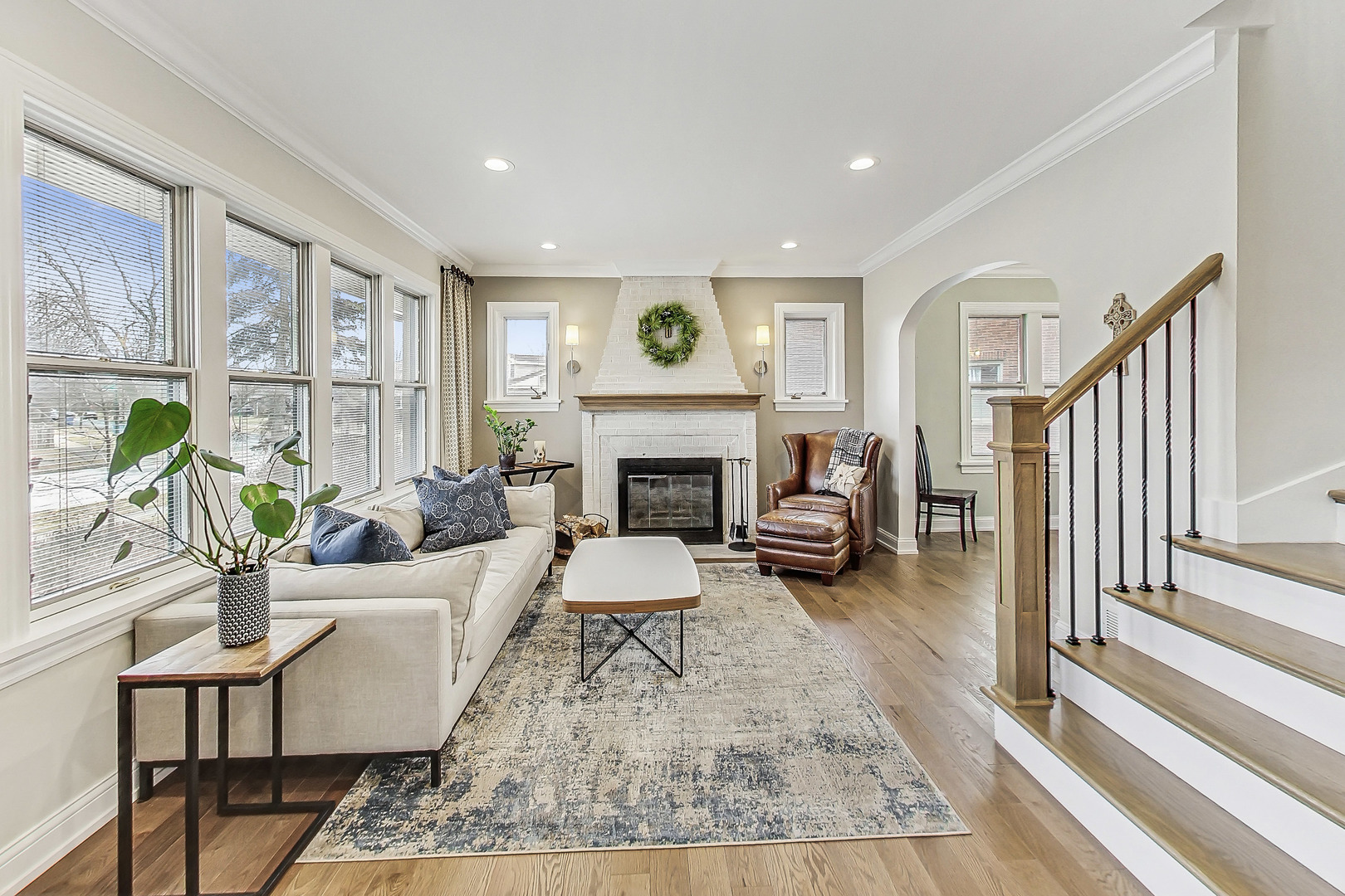 238 South Merrill Street Park Ridge, IL 60068 - Photo 4 of 40 a living room with furniture a fireplace and wooden floor