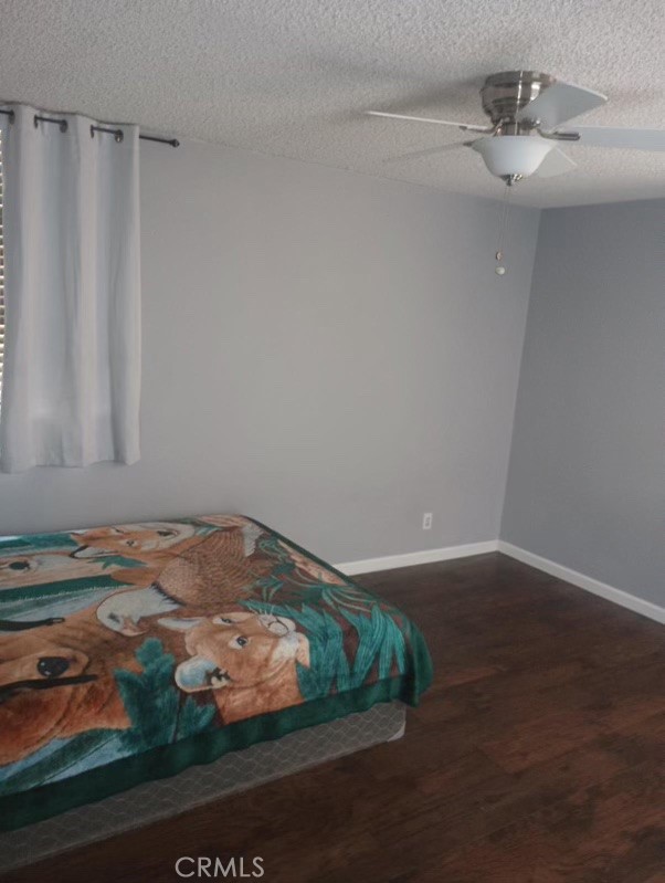 6979 Palm Court, Unit 204A Riverside, CA 92506 - Photo 6 of 6 a room with water heater and wooden floor