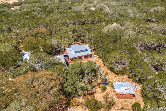 an aerial view of mountain with residential houses
