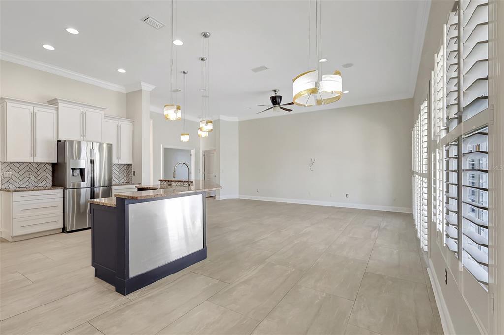 2863 Duncan Tree Circle Valrico, FL 33594 - Photo 27 of 53 a view of kitchen with stainless steel appliances granite countertop living room view