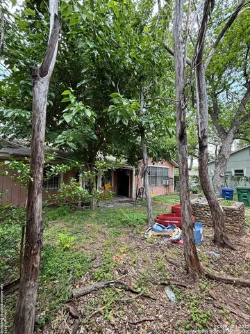 a view of backyard of house