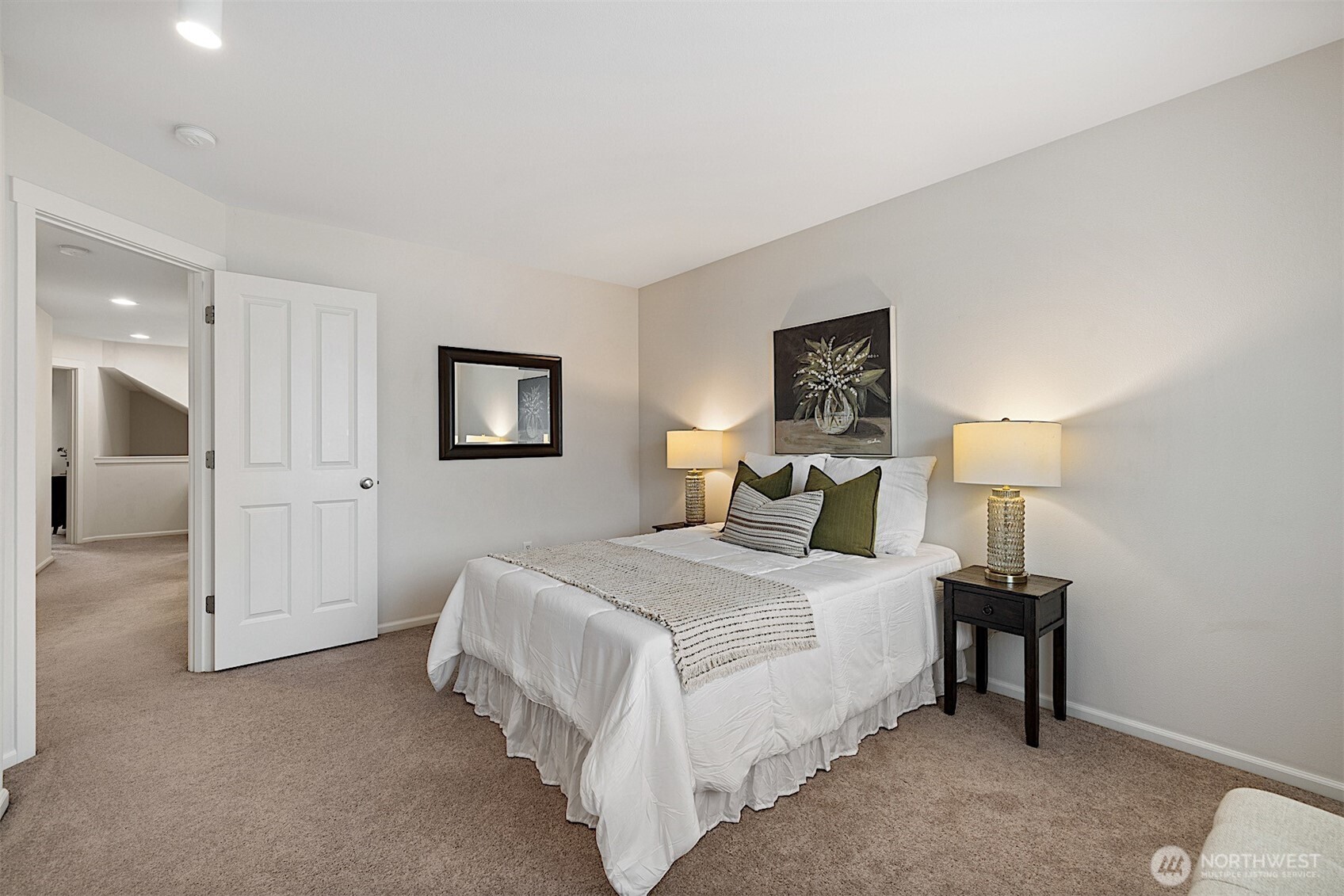 21509 48th Court South, Unit 181 Kent, WA 98032 - Photo 27 of 40 a bedroom with a bed and a lamp